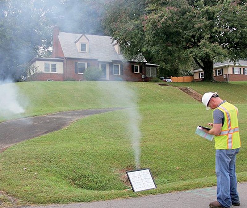 How is smoke used for inspecting underground pipes